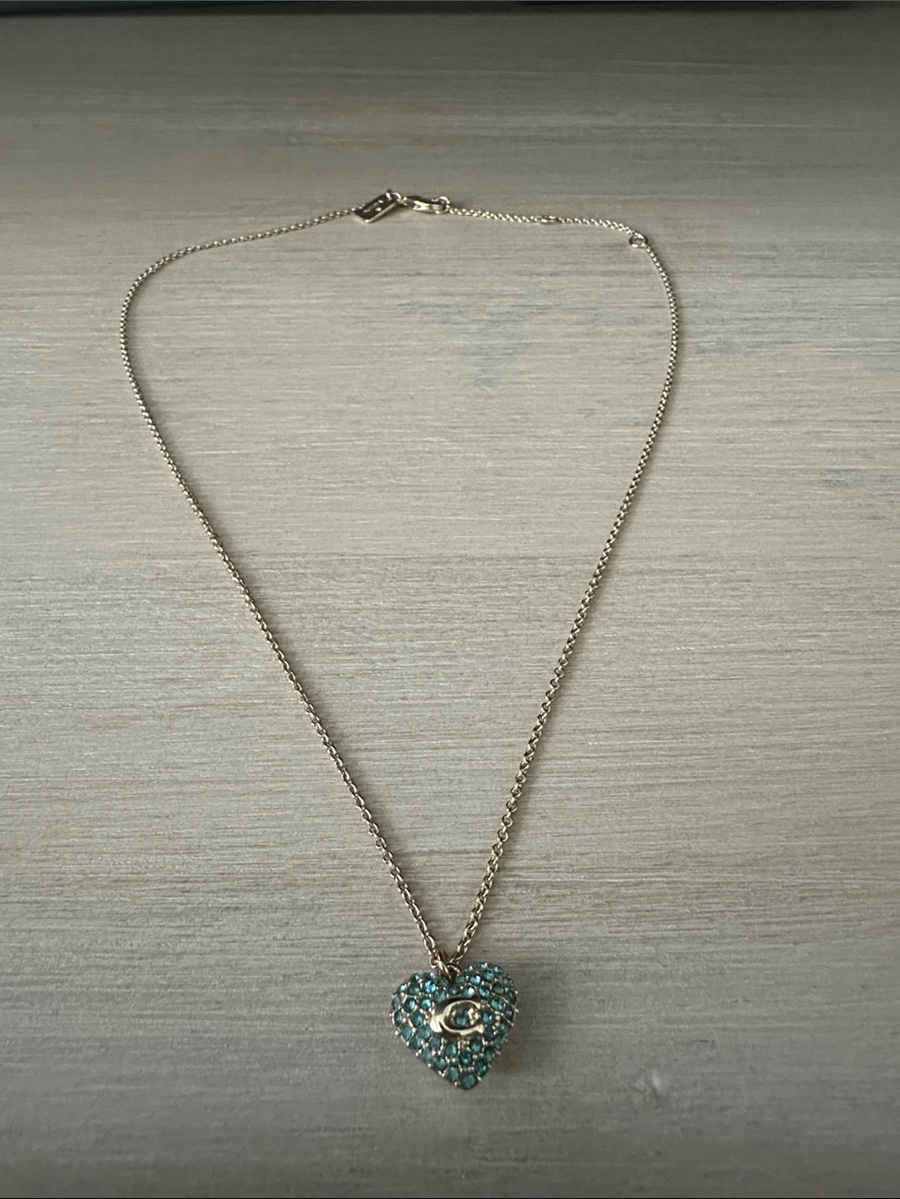 Coach gold and blue crystal heart necklace